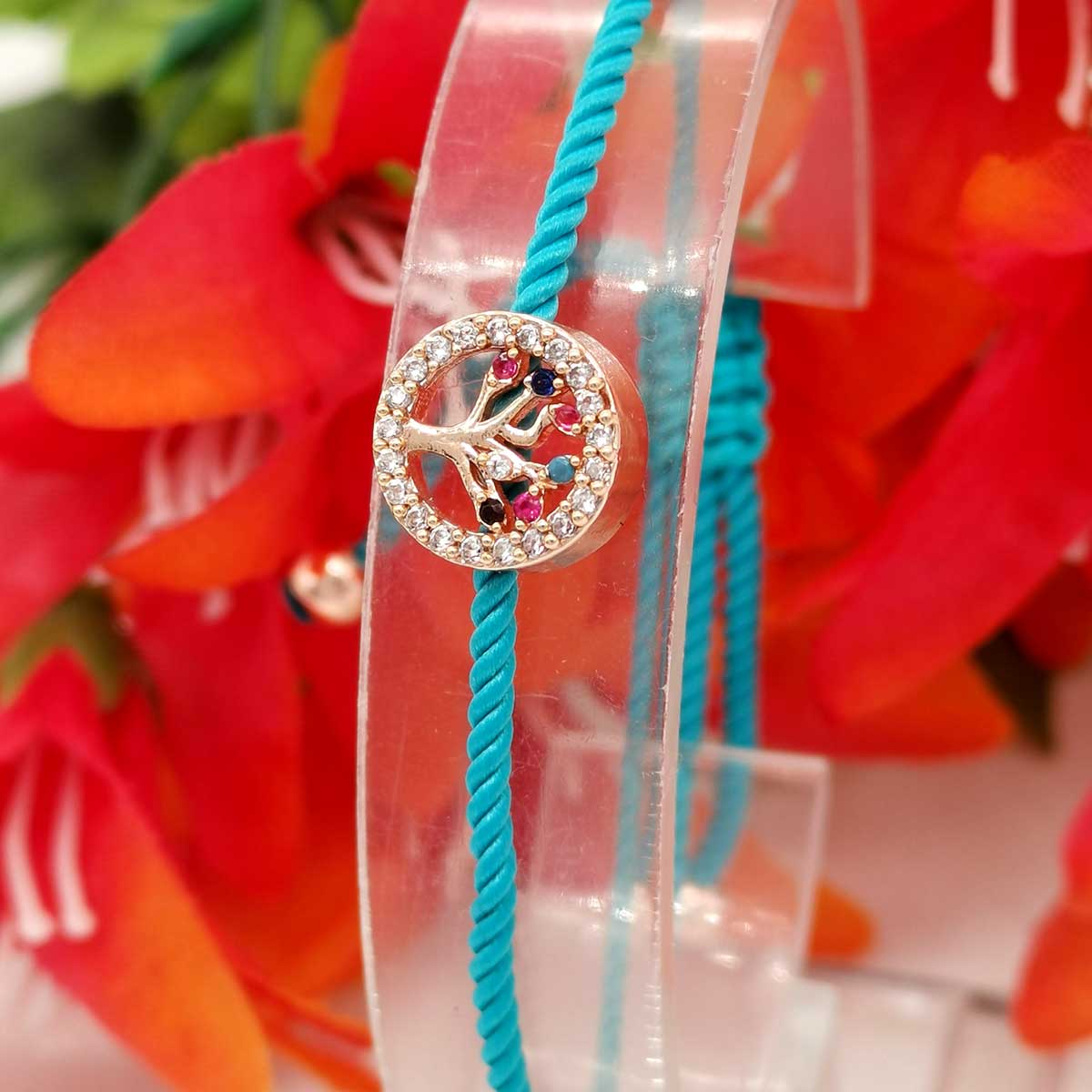 Bracelet Cordon turquoise et son Petit Arbre de Vie Multicolore est simple et discret. Doté d'un long fil réglable, ce bracelet s'adaptera à tous les poignets.