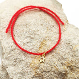 Le Bracelet Fil Rouge et son Etoile de David