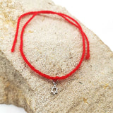 Le Bracelet Fil Rouge et son Etoile de David