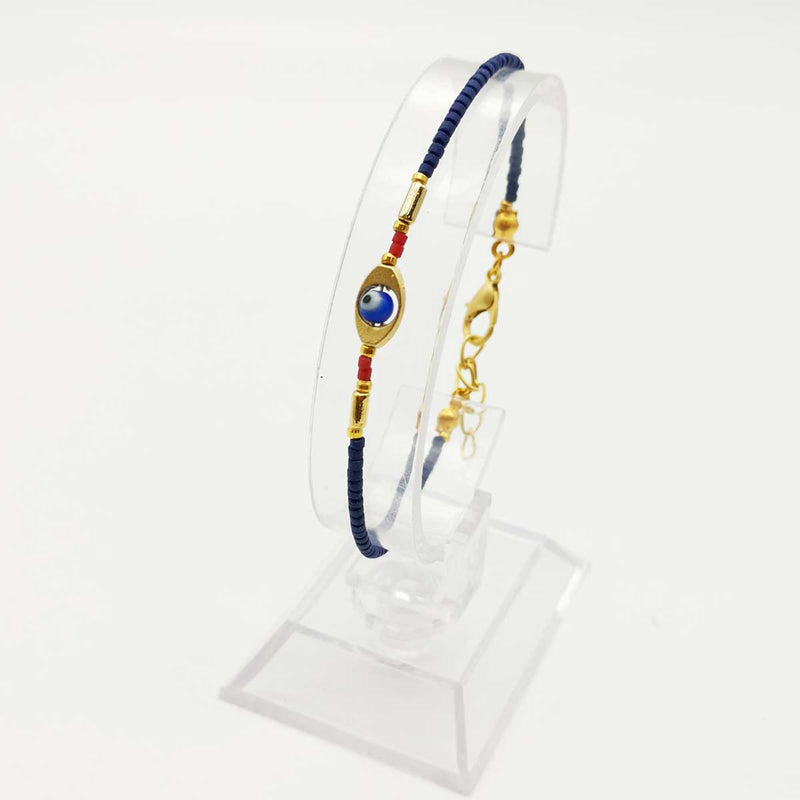Ce joli Bracelet Petites Perles contre le Mauvais Oeil de couleur Bleue Marine à l'allure estivale saura vous séduire par sa simplicité.