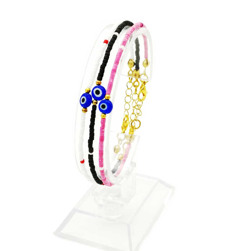 Ce joli bracelet aux perles de céramiques rouges à l'allure estivale saura vous séduire par sa simplicité.